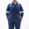 navy coverall wore by man in specs