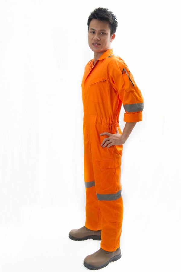 man in orange coverall side view