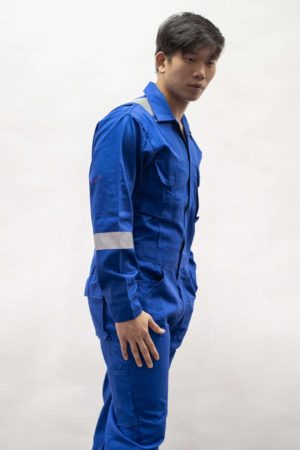 blue fire retardant coverall wore by man